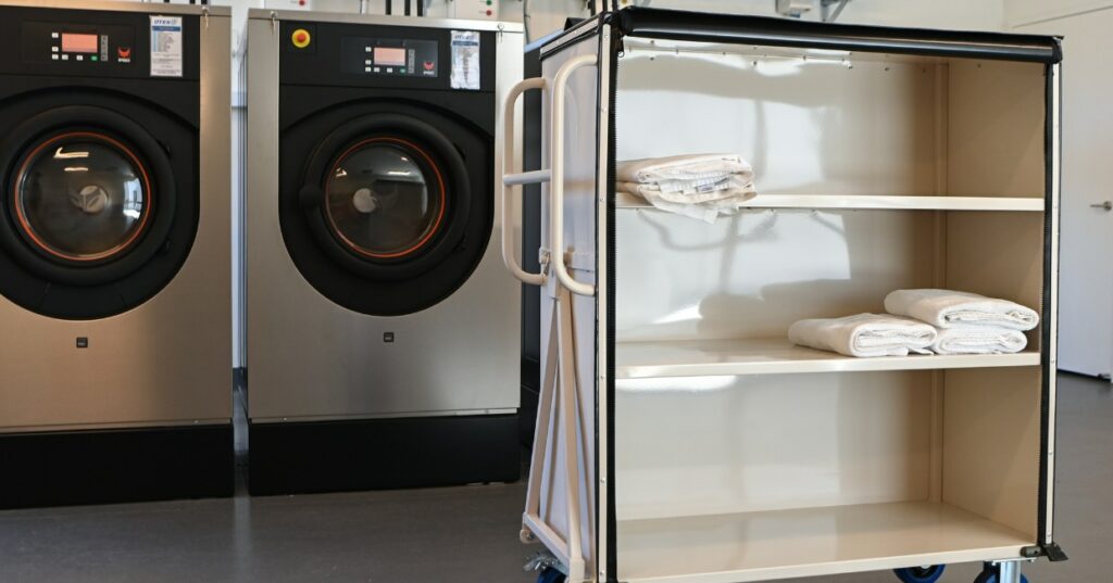 shelf linen trolley in front of washing machine